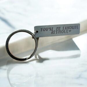 Humorous Silver Keychain